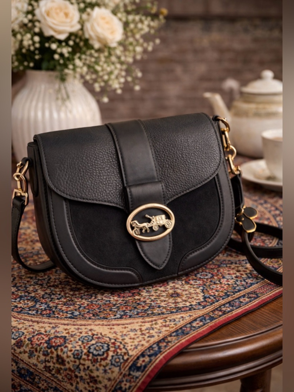 coach navy blue saddle bag used but in good condition
